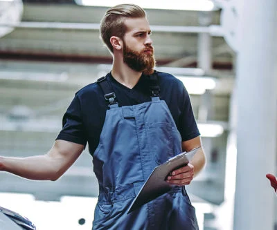 huntington beach auto repair - man working on car